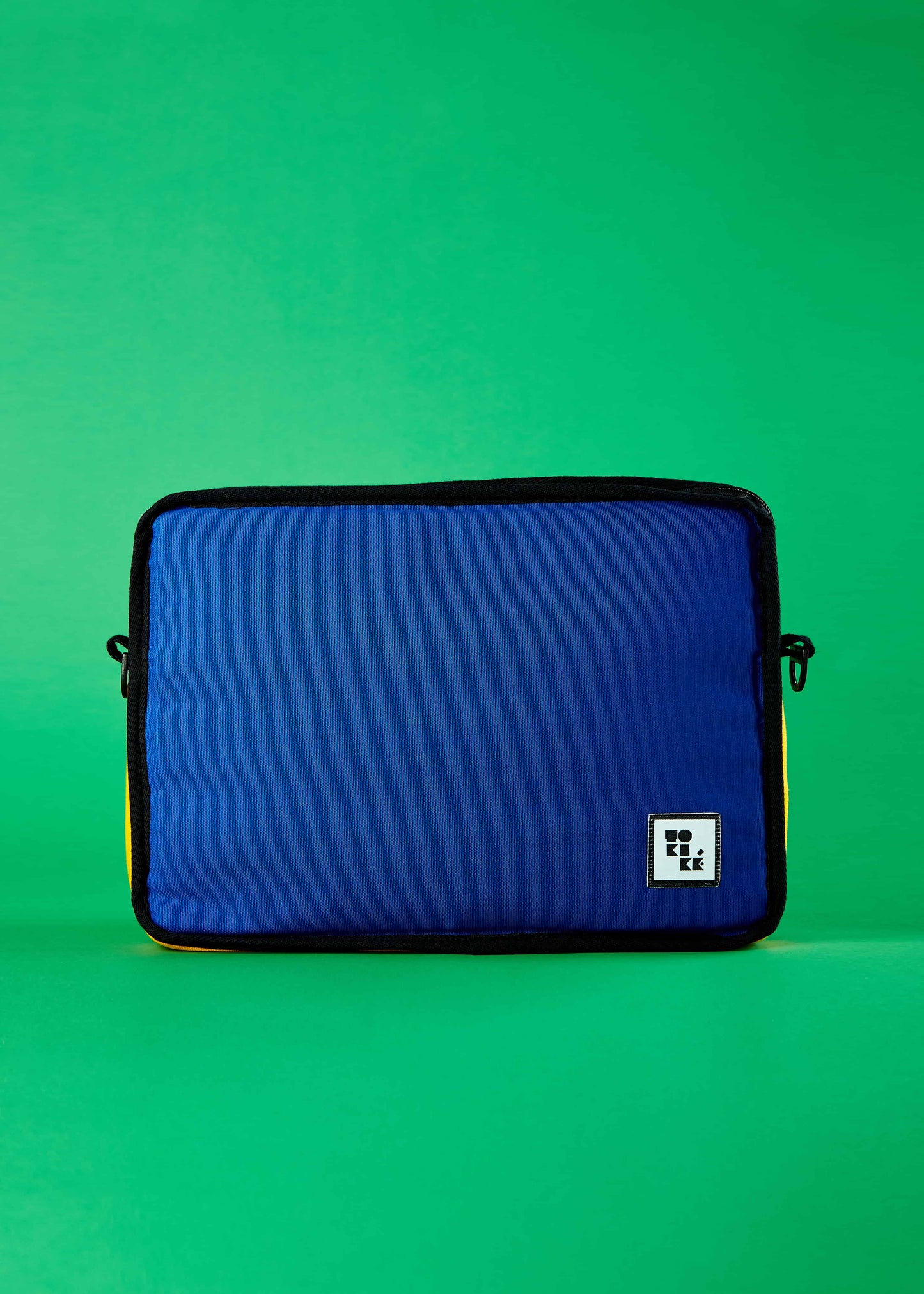 Noa Laptop Sleeve - Embrace Artistic Expression in Your Everyday Carry. A lifestyle shot featuring the Noa laptop sleeve, inviting users to embrace artistic expression in their everyday carry. The Piet Mondrian colorblock artistry brings a unique and creative flair to your tech accessories.
