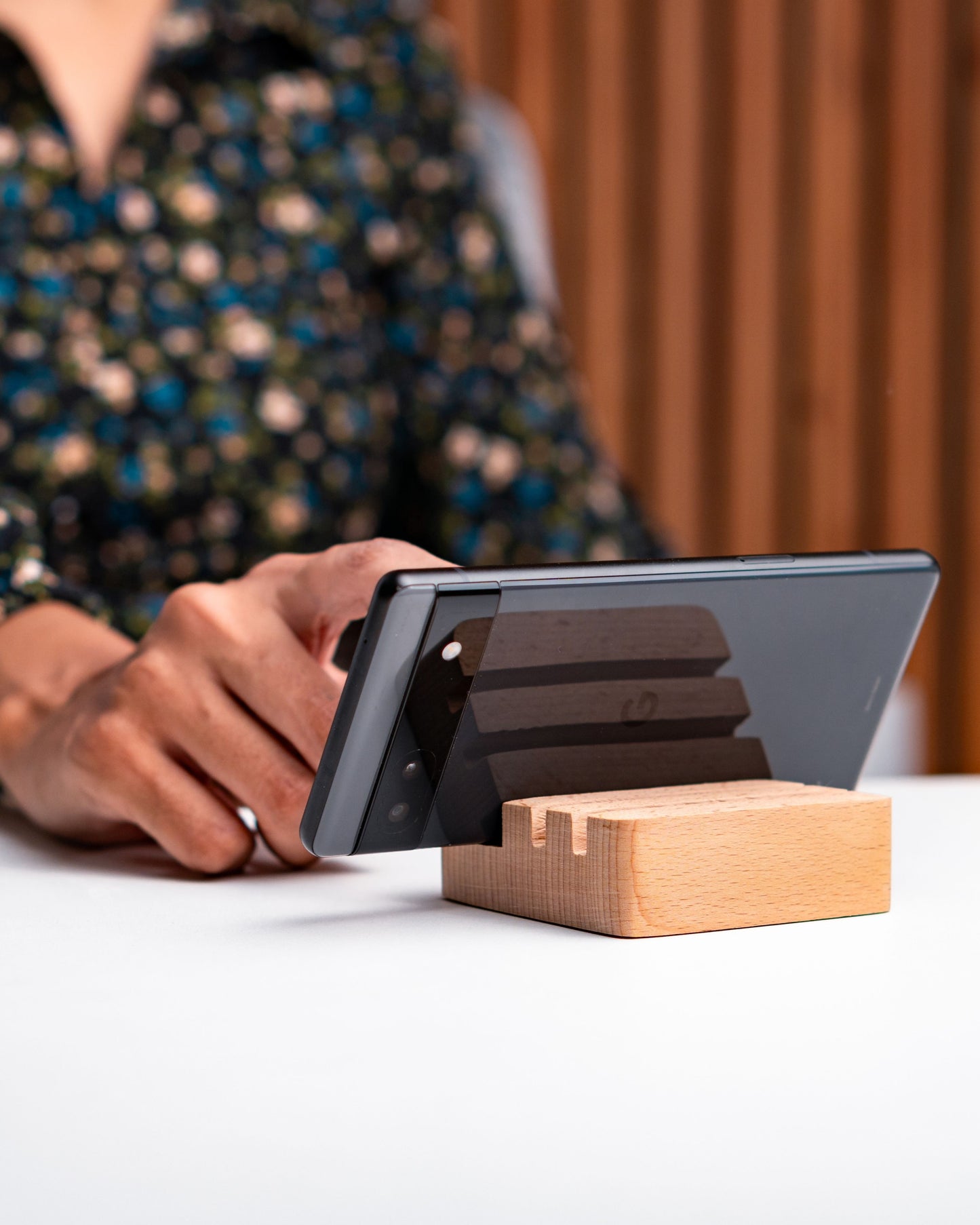 Lady using Wooden Blocks to Use Phone