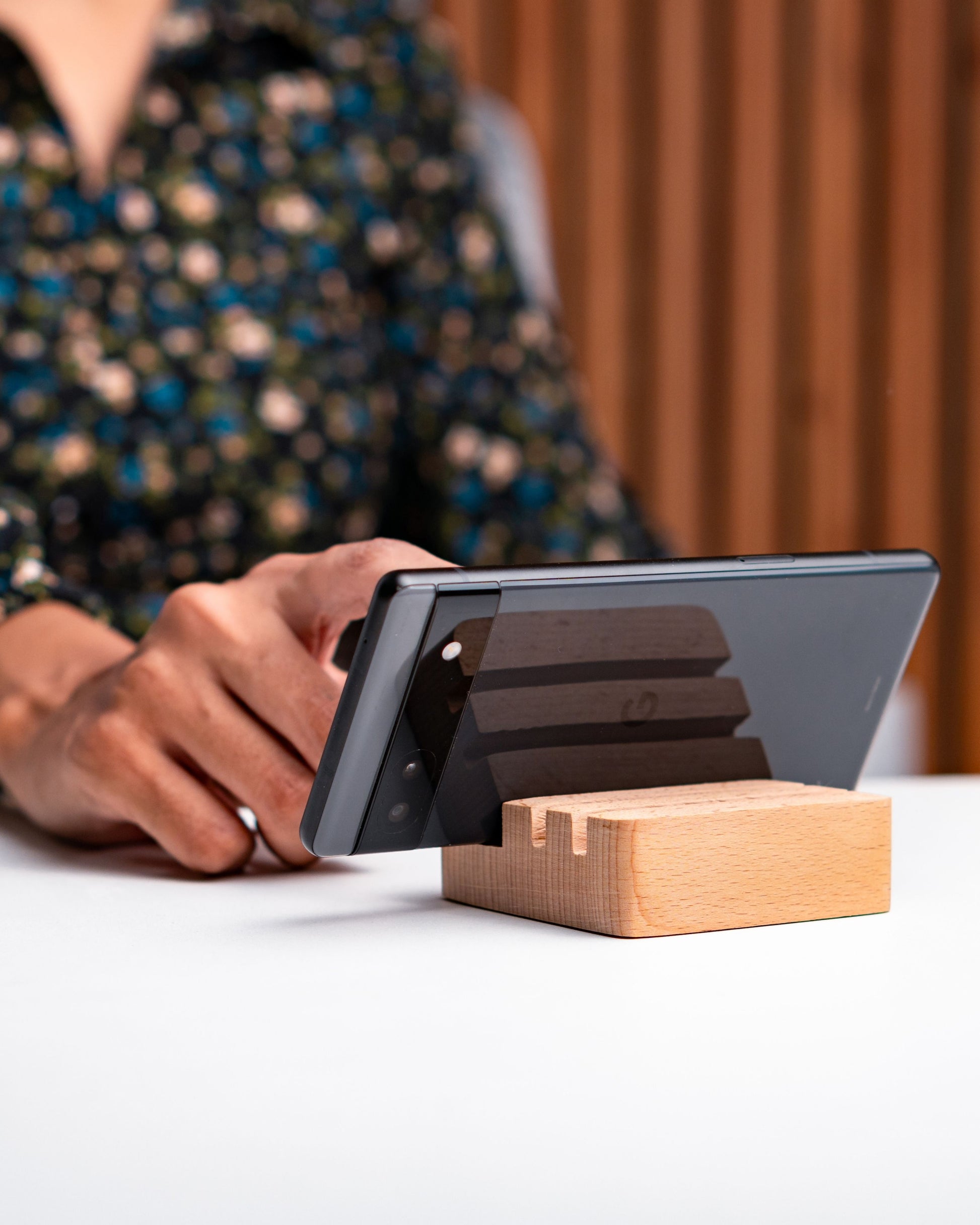 Lady using Wooden Blocks to Use Phone