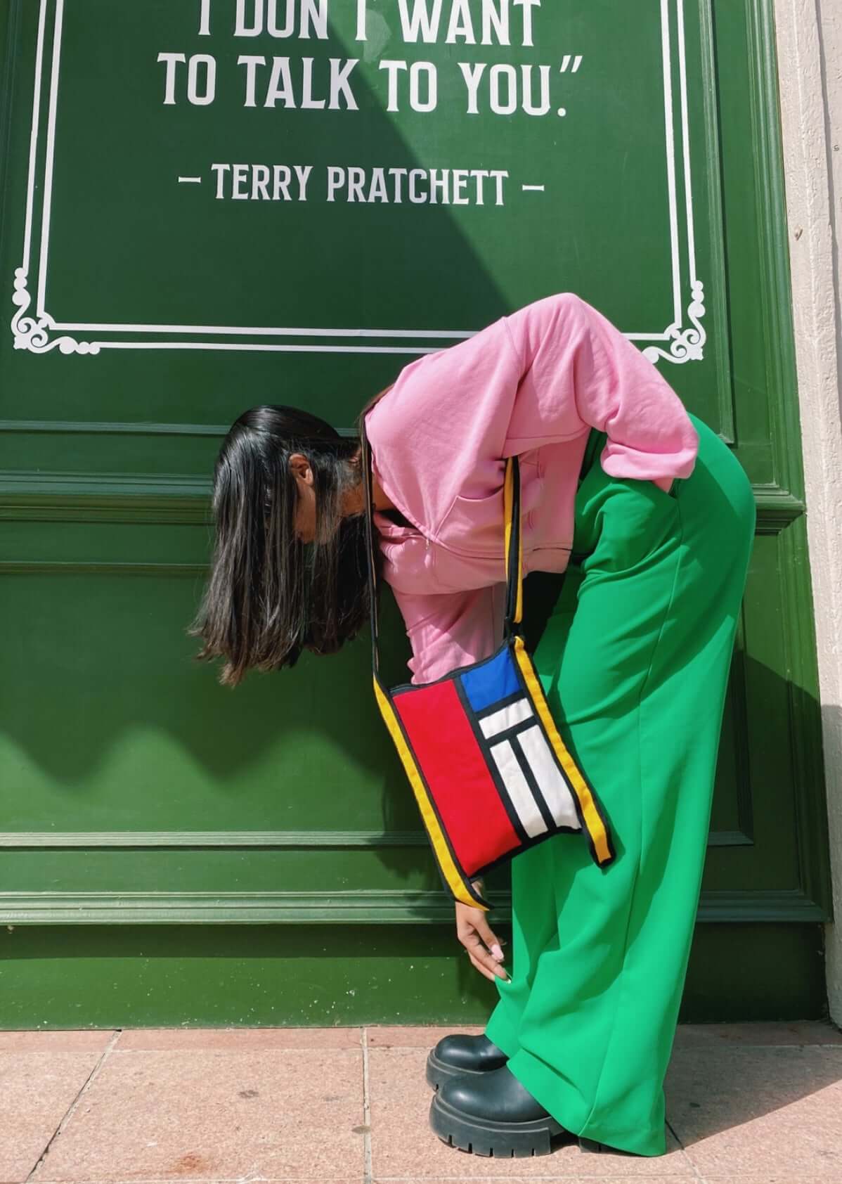 Versatile Rei Urban Jhola - An Everyday Fashion Statement"    Alt text: "A lifestyle shot featuring the Rei urban jhola, a versatile bag that makes an everyday fashion statement. The Piet Mondrian colorblock art design adds an artistic touch to your urban outfit