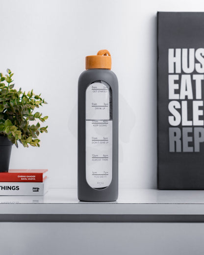 Stotodo Pillar Portable Glass Bottle Grey with a Bamboo Lid in health conscious setting