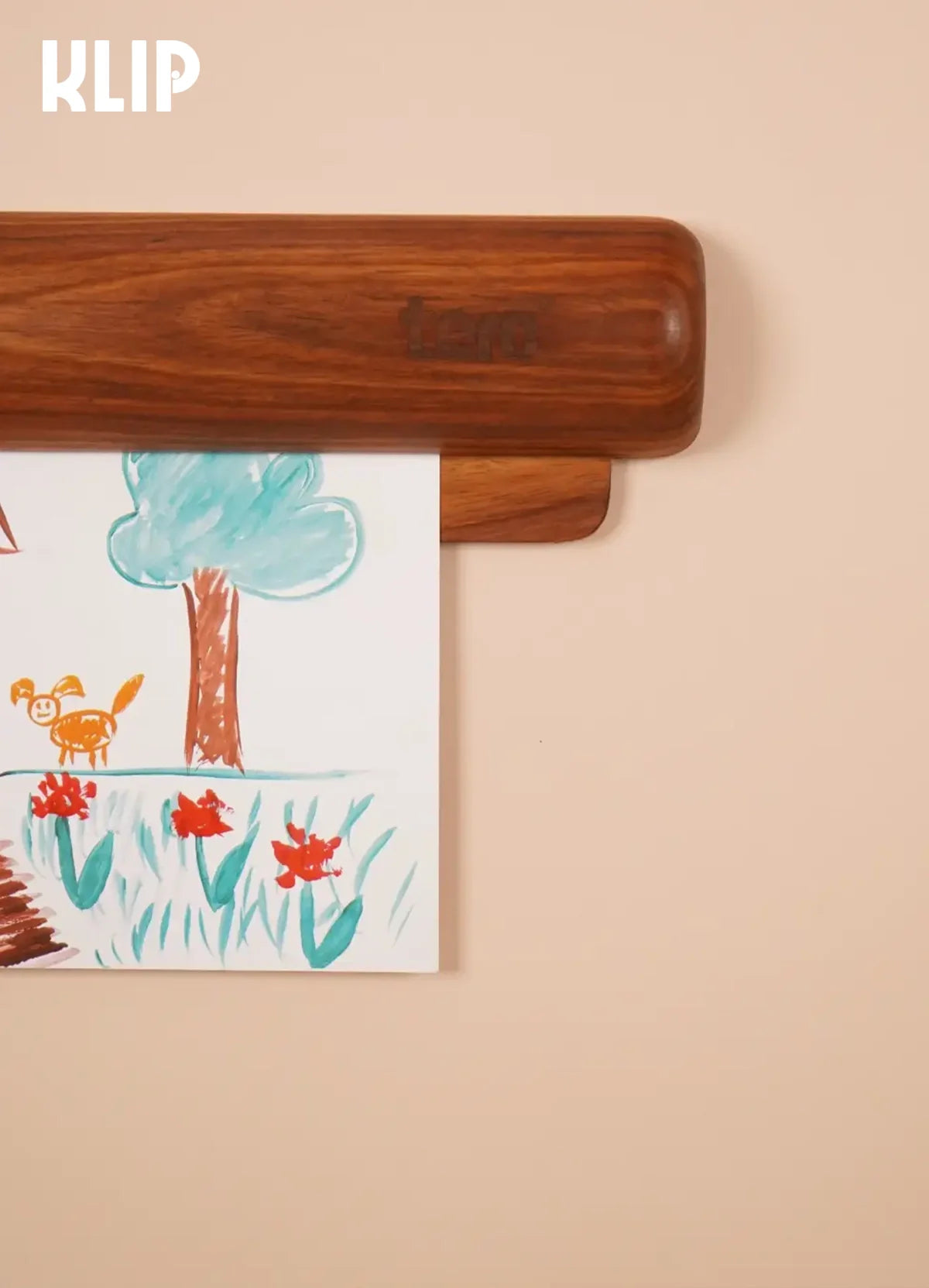 KLIP solid wood wall frame in use displaying a sketch with easy paper swap in seconds