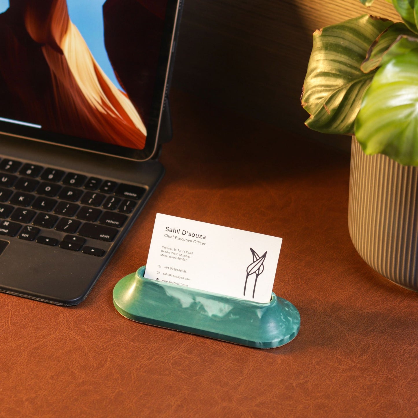 Aero Task Dock styled on a minimal desk with a task card inserted – analog productivity tool